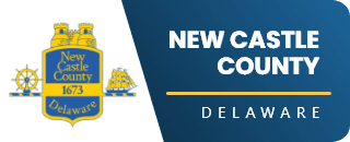 New Castle County, Delaware banner featuring the county seal with symbols and the founding year 1673, alongside text on a blue background.